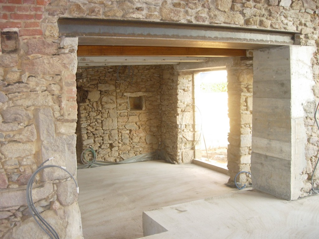 Ouverture de mur en pierre, en béton à Aubin